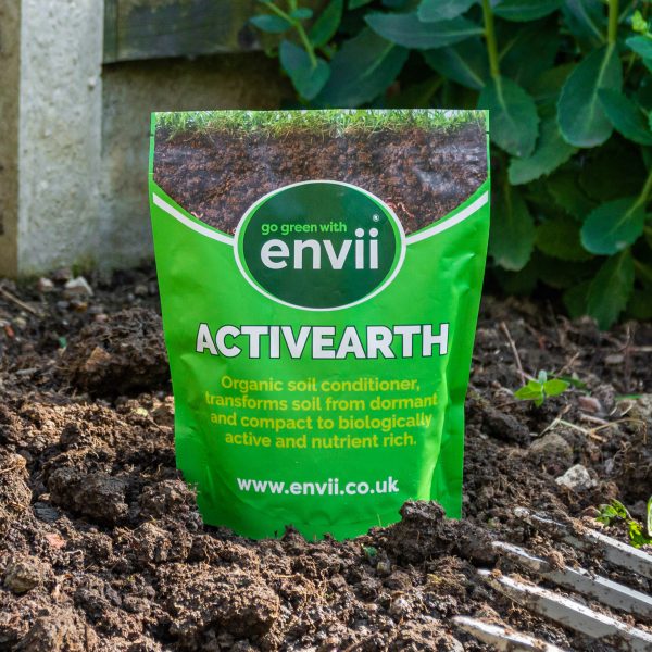 Activearth lifestyle product stood in soil